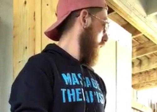 Young bearded guy wanking outdoors